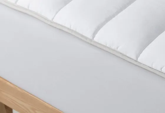 Захисний стьобаний наматрацник на гумці